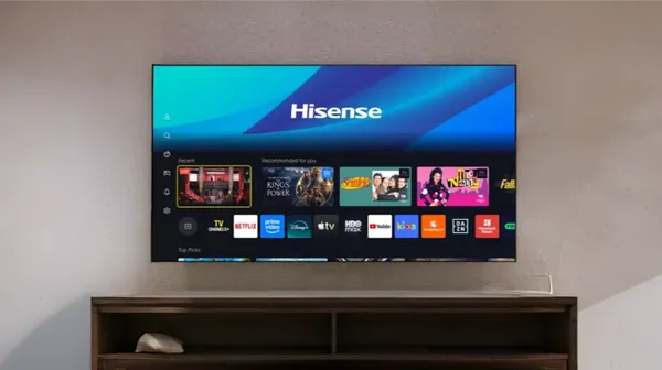 Hisense U7SE Mini-LED smart TV displaying the VIDAA Smart OS interface on a wall-mounted large-screen television.
