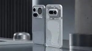 Nothing smartphones in black, white, pink, and blue color options showcasing the brand’s transparent rear-panel design and dual-camera setup.